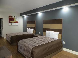 Grand Villa Inn & Suites Chinatown Houston Rom bilde